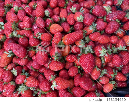 Fresh strawberries filling frame, ideal for summer-related themes or as vibrant fruit background 138154420