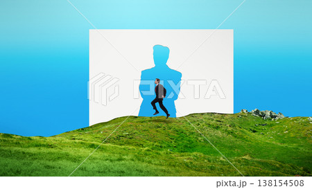 Businessman running through human silhouette cutout on green hills. Businessman running through human silhouette cutout on green hills. 138154508