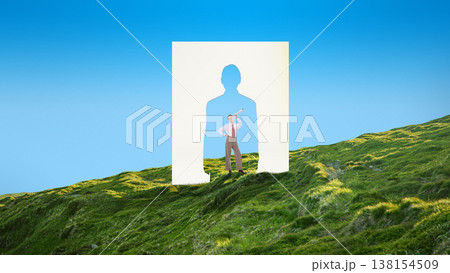 Businesswoman holding telescope inside human silhouette cutout in green hills. Businesswoman holding telescope inside human silhouette cutout in green hills. 138154509