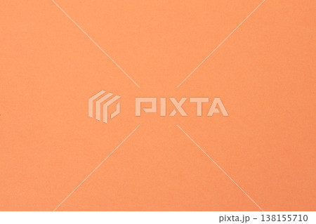 Smooth coral peach paper background with warm pastel tones for minimalist design concept Smooth coral peach paper background with warm pastel tones for minimalist design concept 138155710