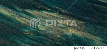 Abstract teal and gold brushstroke texture with diagonal flowing paint pattern for background Abstract teal and gold brushstroke texture with diagonal flowing paint pattern for background 138155713