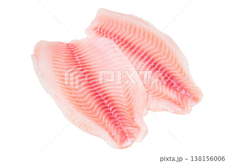 Raw tilapia fillet isolated on white background, fresh freshwater fish meat from aquaculture with visible muscle texture. 138156006
