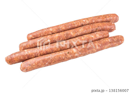Uncooked sausage links isolated on clean white background. Fresh minced pork meat in natural casing ready for grilling barbecue cooking or dinner preparation. Uncooked sausage links isolated on clean white background. Fresh minced pork meat in natural casing ready for grilling barbecue cooking or dinner preparation. 138156007