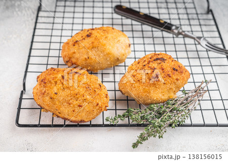 Stuffed chicken cutlet with herbs and cheese. Stuffed chicken cutlet with herbs and cheese. 138156015