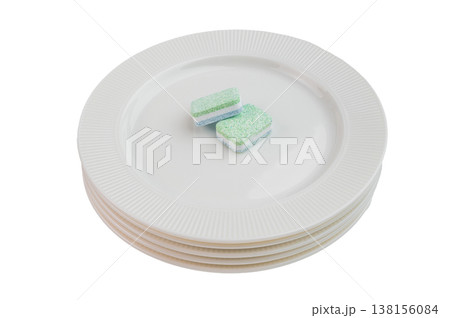 Solid cleaning tablets for automatic dishwasher on white background highlighting texture layers and home hygiene routine Solid cleaning tablets for automatic dishwasher on white background highlighting texture layers and home hygiene routine 138156084