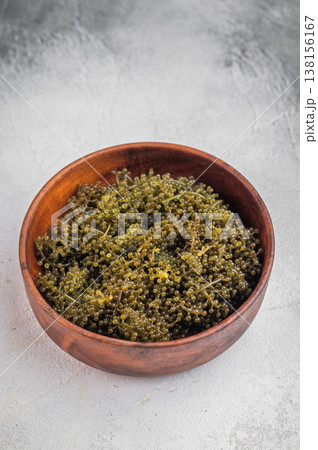 Raw umibudo sea grapes also called green caviar and sea caviar served as exotic seaweed salad with dipping sauce Raw umibudo sea grapes also called green caviar and sea caviar served as exotic seaweed salad with dipping sauce 138156167