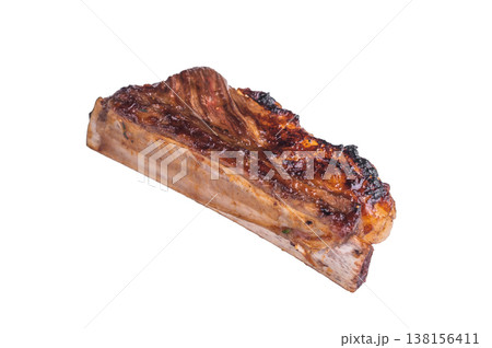 Isolated Beef Short Rib, Extreme close-up of a single, glazed beef rib on the bone, isolated on a clean white background. 138156411