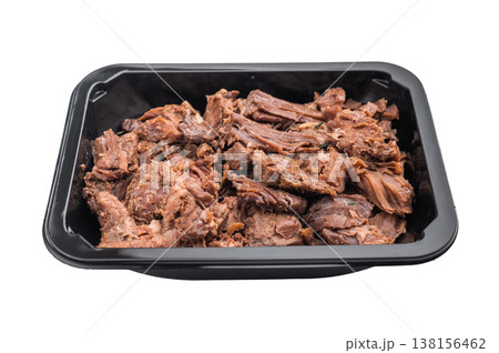 Stewed venison elk meat in a black container on white background, tender braised wild game ready meal rich in flavor and protein. 138156462