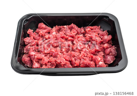 Fresh raw minced beef in a black plastic tray on a clean white background ideal for butcher retail grocery and food stock photography. Fresh raw minced beef in a black plastic tray on a clean white background ideal for butcher retail grocery and food stock photography. 138156468
