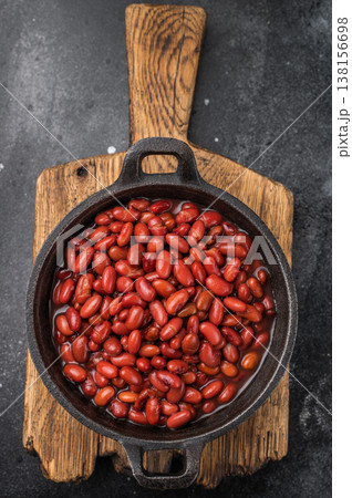 Top view of healthy vegan bean stew, garnished with fresh herbs. Moody style perfect for restaurant menus or recipe blogs. Top view of healthy vegan bean stew, garnished with fresh herbs. Moody style perfect for restaurant menus or recipe blogs. 138156698