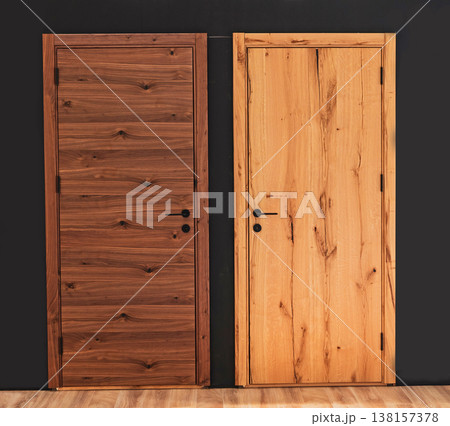 Dark and light wooden closed doors 138157378