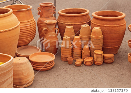 Earth ware pots and jars outside 138157379