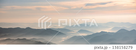 Landscape panorama with morning fog in spring mountains Landscape panorama with morning fog in spring mountains 138158279