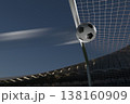Soccer ball hitting the net, scoring a goal in a professional stadium 138160909