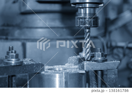 Heavy-duty rough cutting process on metal parts using an NC milling machine with a flat nose end mill tool. 138161786