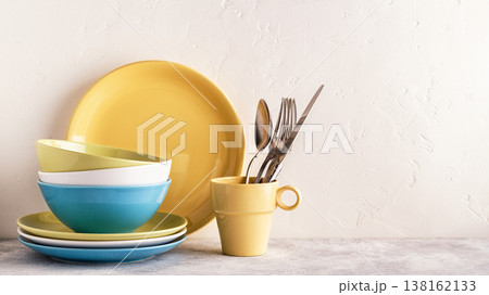 Crockery and cutlery on a light table. Crockery and cutlery on a light table. 138162133