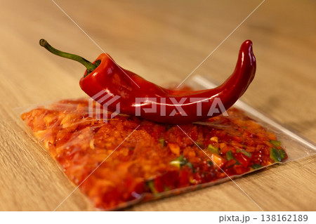 Sliced red pepper in a pack for freezing in the freezer. Cooking from frozen foods. 138162189
