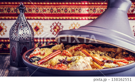 Traditional moroccan tajine of chicken with dried fruits and spices. 138162551