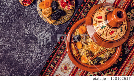 Traditional moroccan tajine of chicken with dried fruits and spices. 138162637