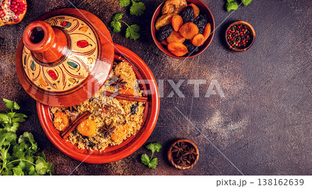 Traditional moroccan tajine of chicken with dried fruits and spices. Traditional moroccan tajine of chicken with dried fruits and spices. 138162639