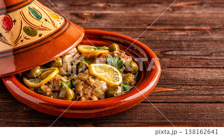 Traditional Moroccan chicken tagine with olives and salted lemons 138162641