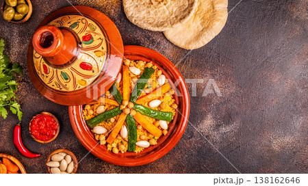Vegetable tagine with almond and chickpea couscous Vegetable tagine with almond and chickpea couscous 138162646