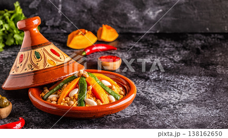 Vegetable tagine with almond and chickpea couscous. Vegetable tagine with almond and chickpea couscous. 138162650