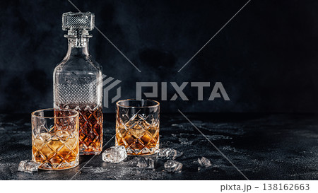 Glasses of the whiskey with a square decanter Glasses of the whiskey with a square decanter 138162663