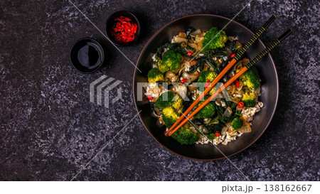 Cooking asian stir fry rice with vegetables Cooking asian stir fry rice with vegetables 138162667