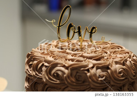 Layered Chocolate Wedding Cake With Swirled Frosting 138163355