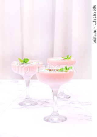 fruit mousse, made from jelly and cottage cheese, in glasses, decorated with sprinkles and mint, homemade fruit mousse, made from jelly and cottage cheese, in glasses, decorated with sprinkles and mint, homemade 138165906