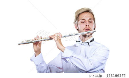Male flutist playing his flute 138166375