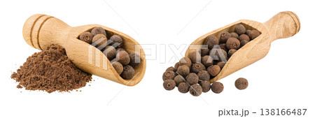 Allspice pepper and ground in wooden scoop isolated on white background. Jamaica pepper, Pimenta dioica or myrtle pepper Allspice pepper and ground in wooden scoop isolated on white background. Jamaica pepper, Pimenta dioica or myrtle pepper 138166487