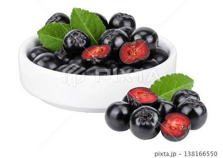 Chokeberry in ceramic bowl isolated on white background. Black aronia. 138166550