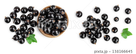 Black currants in bowl on white background.Top view. Flat lay pattern Black currants in bowl on white background.Top view. Flat lay pattern 138166645