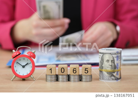 Balancing finances with careful planning and time management in a busy workspace Balancing finances with careful planning and time management in a busy workspace 138167051
