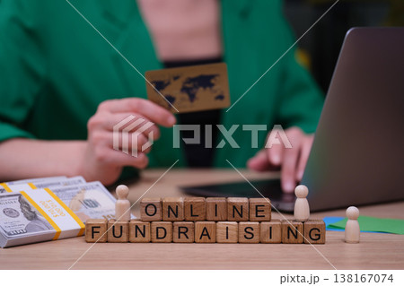 Innovative online fundraising event showcases creativity with tools and digital interactions in a modern workspace setting Innovative online fundraising event showcases creativity with tools and digital interactions in a modern workspace setting 138167074