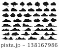 A large set of white clouds of different shapes on a black background. 138167986