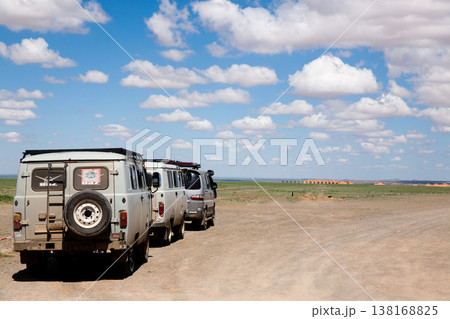 Off-road vehicles in remote region of Mongolia. Gobi desert area Off-road vehicles in remote region of Mongolia. Gobi desert area 138168825