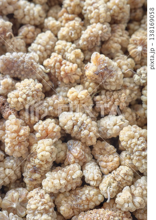 Close up photo of dried white mulberry, selective focus. Close up photo of dried white mulberry, selective focus. 138169058