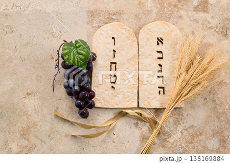 Shavuot ten commandments tablets with grapes and wheat Shavuot ten commandments tablets with grapes and wheat 138169884