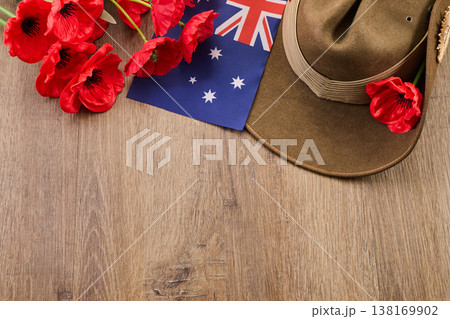 Anzac day remembrance with slouch hat, flag, and poppies Anzac day remembrance with slouch hat, flag, and poppies 138169902