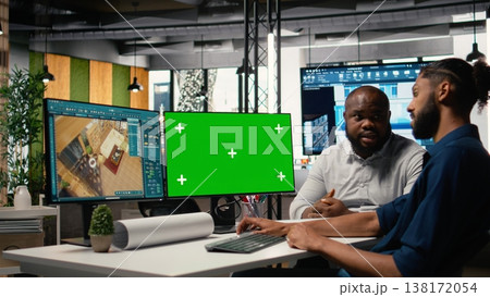 Real estate investor and developer planning layout with isolated pc, preparing infrastructure designs and reviewing housing and commercial property development strategy in office. Real estate investor and developer planning layout with isolated pc, preparing infrastructure designs and reviewing housing and commercial property development strategy in office. 138172054