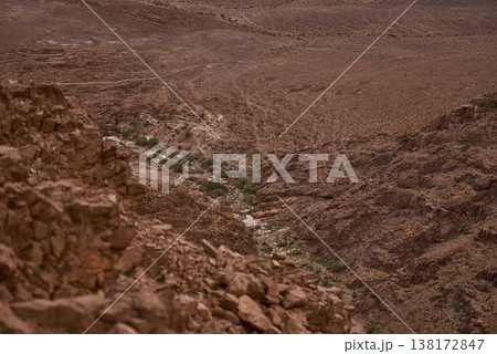 Rock texture background, natural stone surface, abstract cracked desert rocks pattern 138172847