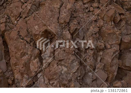 Rock texture background, natural stone surface, abstract cracked desert rocks pattern 138172861