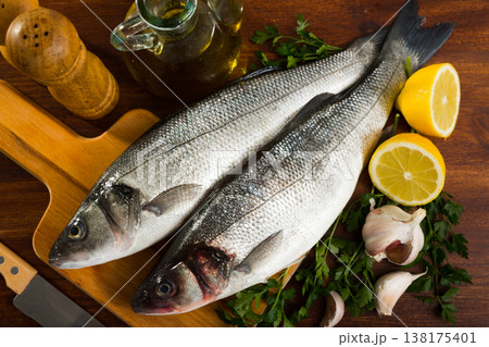 Two raw sea bass fish 138175401