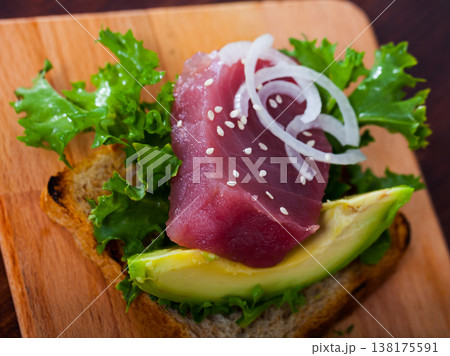 Toast with raw tuna and avocado 138175591