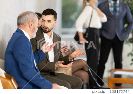 Mature man talking to company manager Mature man talking to company manager 138175744