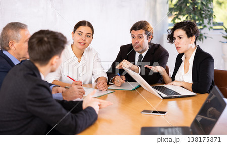 Group of business colleagues planning work in joint meeting 138175871