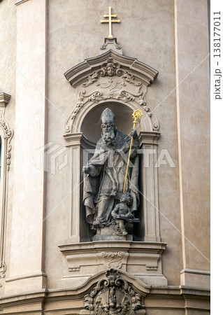 Saint Nicholas statue on church facade in Prague Saint Nicholas statue on church facade in Prague 138177011